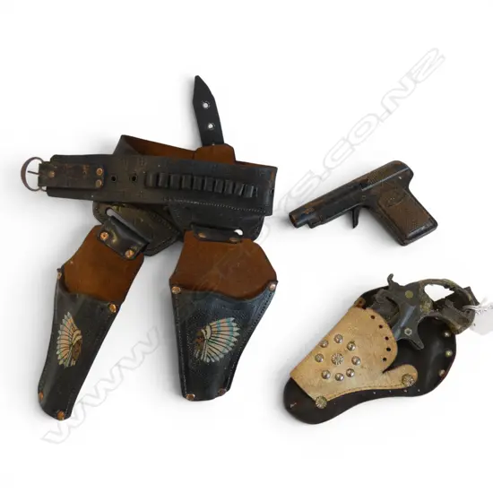 TWO VINTAGE TOY PISTOLS + TWO COWBOY HOLSTERS