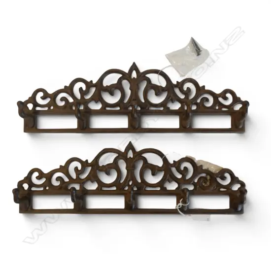 TWO CAST IRON COAT RACKS W.385mm