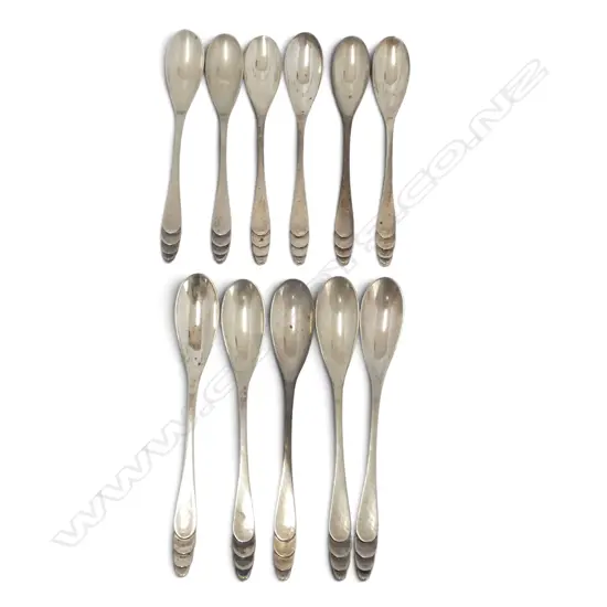 11 CONTINENTAL .850 SILVER SPOONS 128gms