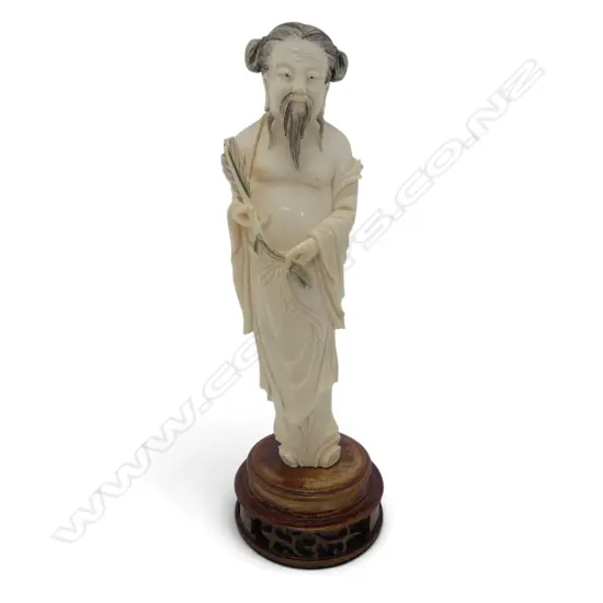 CHINESE CARVED IVORY robed aged figure holding fan H.230mm