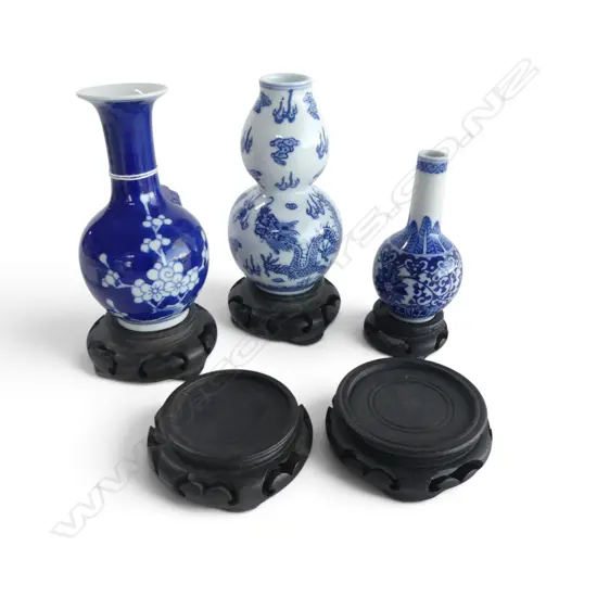3 ORIENTAL B & W VASES tallest 130mm. + 5 wooden stands