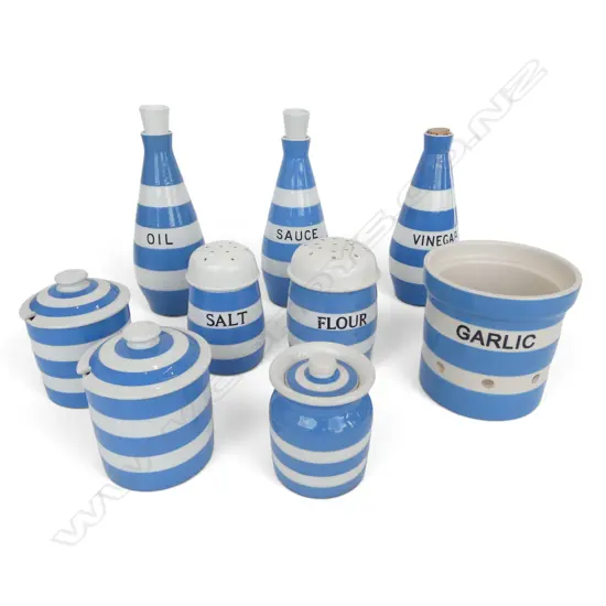 9 PCES OF CORNISHWARE vinegar, oil, sauce, etc H.120mm