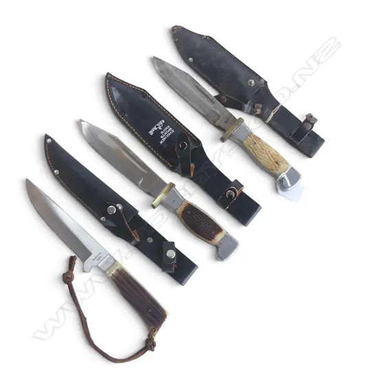 3 VINTAGE HUNTING KNIVES in leather belt sheaths. Longest 270mm