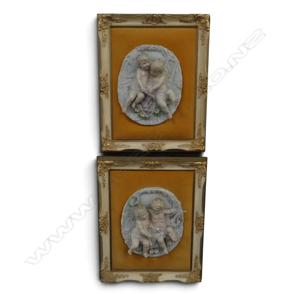 20th C.PAIR OF DECORATIVE COMPOSITE PANELS OF PUTTI AND GRAPES HOUSED IN GILT FRAME 380 X 430mm (INCL FRAME EACH) Image 1++