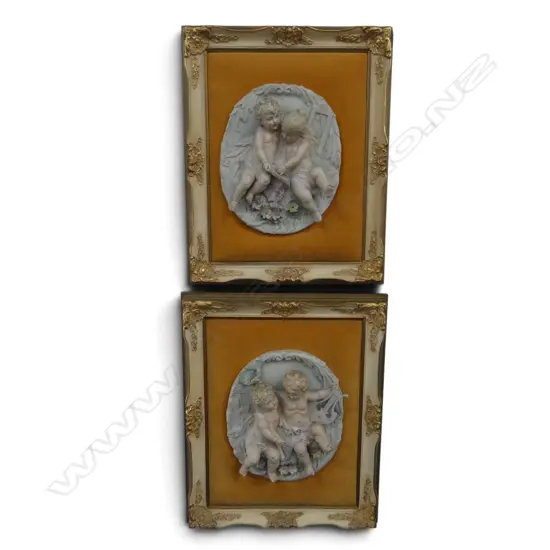 20th C.PAIR OF DECORATIVE COMPOSITE PANELS OF PUTTI AND GRAPES HOUSED IN GILT FRAME 380 X 430mm (INCL FRAME EACH)