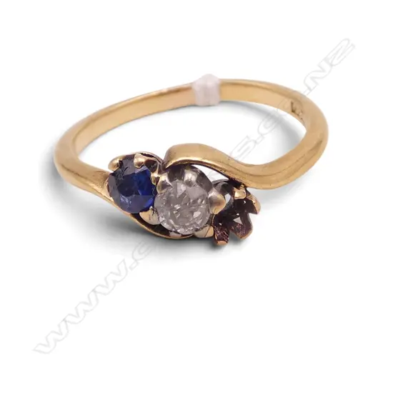 18CT GOLD DIAMOND AND SAPPHIRE RING (one sapphire absent) 2.79gms SIZE M