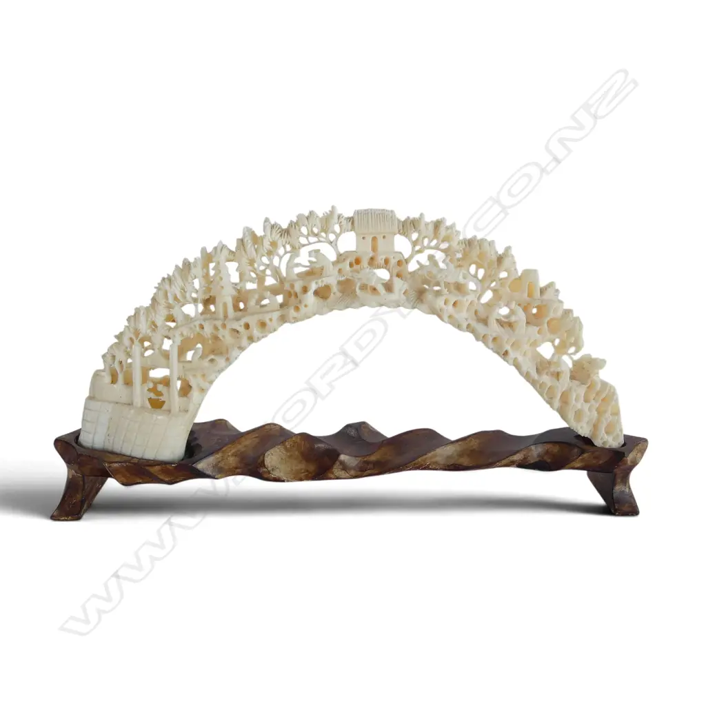 Fine intricately carved vintage carved hippo tusk landscape bridge with figures. L.225mm. On stand. Repair to bridge. Image 1++