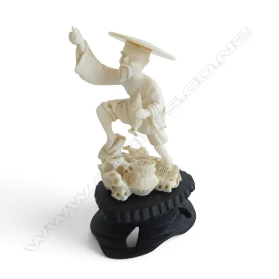 OLD JAPANESE CARVED IVORY FIGURE of a fisherman no pole. On stand. H.112mm H.100mm