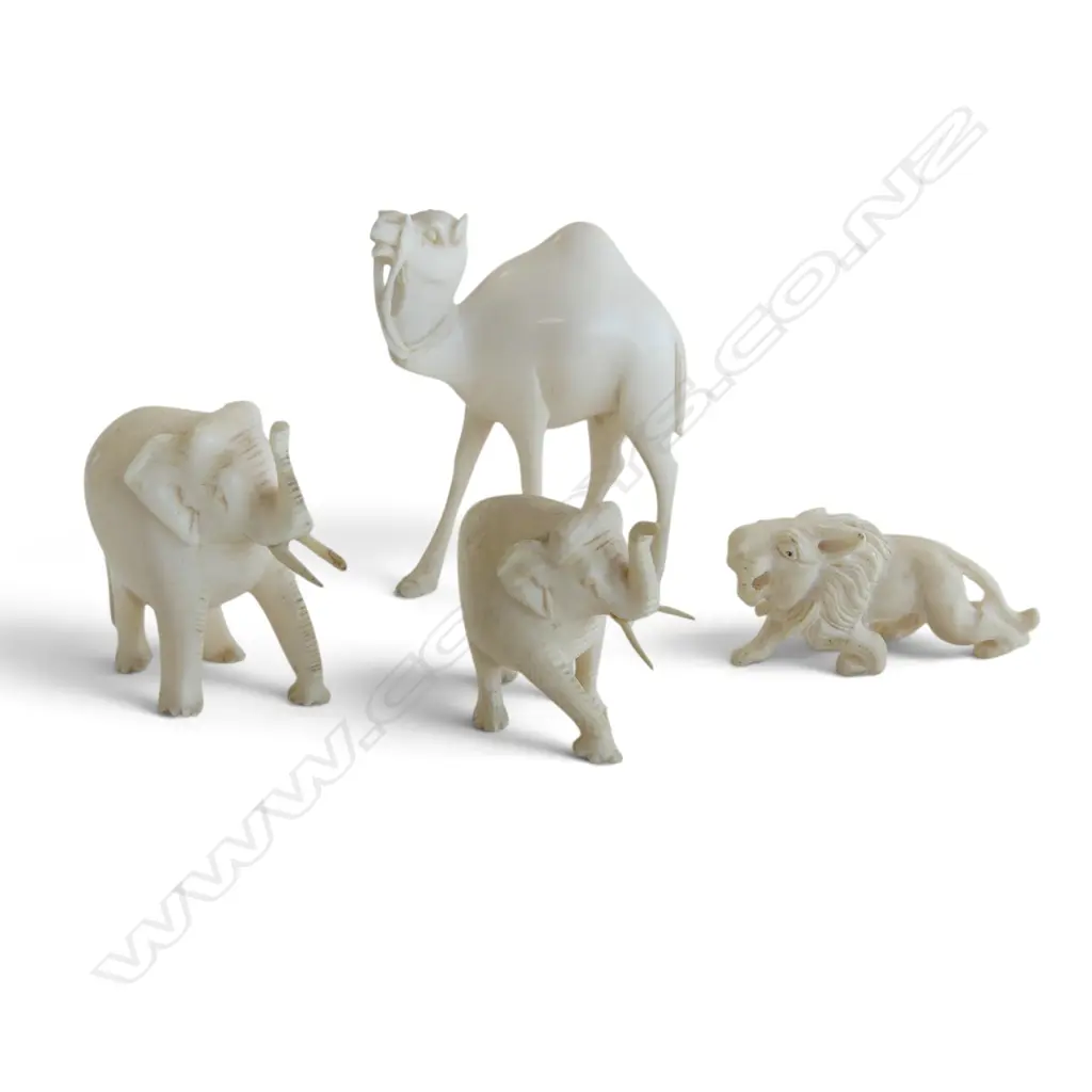 4 CARVED IVORY  ANIMALS. Lion + 2 elephants + camel H.65mm Image 1++
