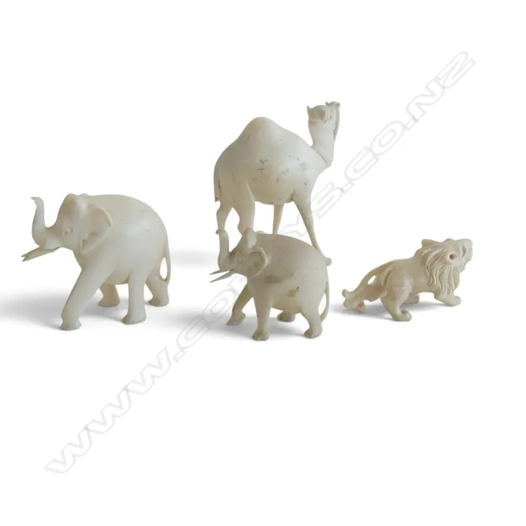 4 CARVED IVORY  ANIMALS. Lion + 2 elephants + camel H.65mm Image 1++