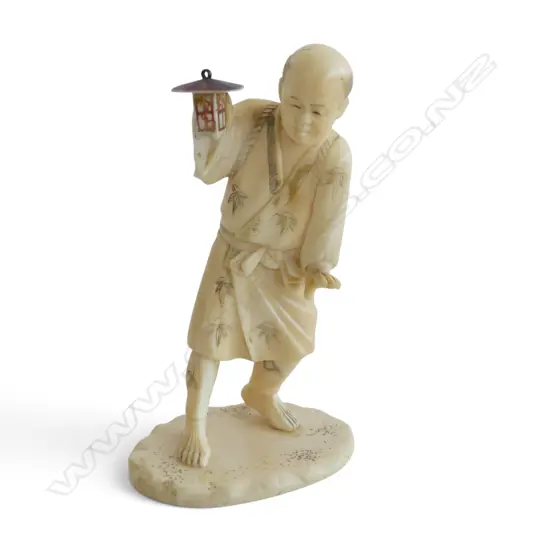 OLD JAPANESE CARVED IVORY FIGURE of an elderly gent walking with a lantern. Some faults. H.100mm