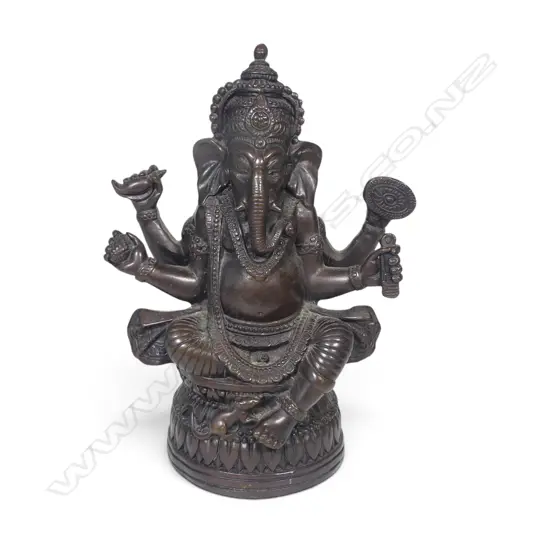 DARK METAL BRONZED FIGURINE OF SEATING GANESHA ON A LOTUS FLOWER PEDESTAL. H.170MM