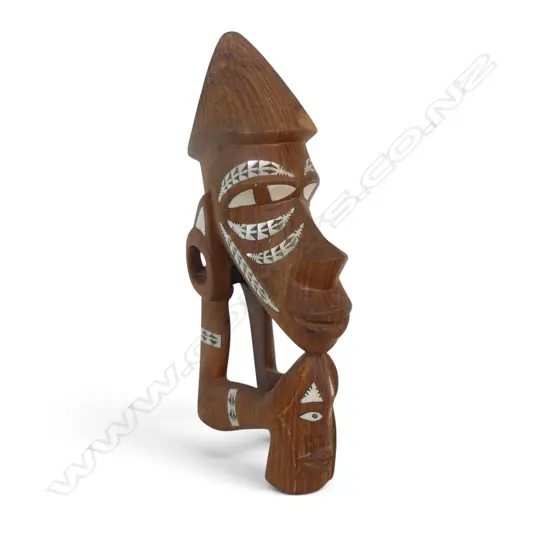 HAND CARVED SOLOMON ISLANDS WOODEN NGUZUNGUZU FIGUREHEAD WITH TRADITIONAL GEOMETRIC MOP INLAYS. 230 X 130MM