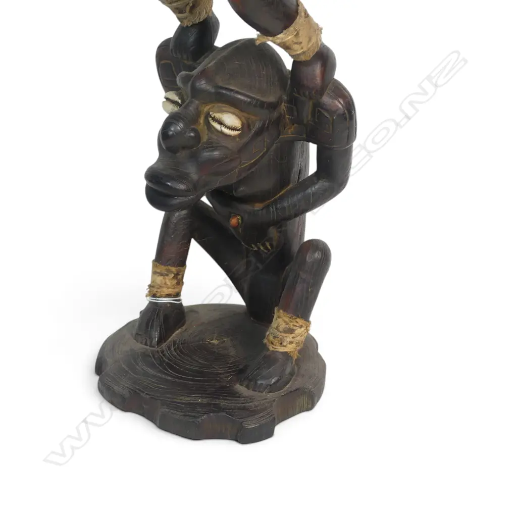 EAST AFRICAN HAND CARVED WOODEN SCULPTURE OF A MAKONDE SHETANI (SPIRIT), COWRIE SHELL INLAY & NATURAL FIBRE, 570 X 160MM Image 1++