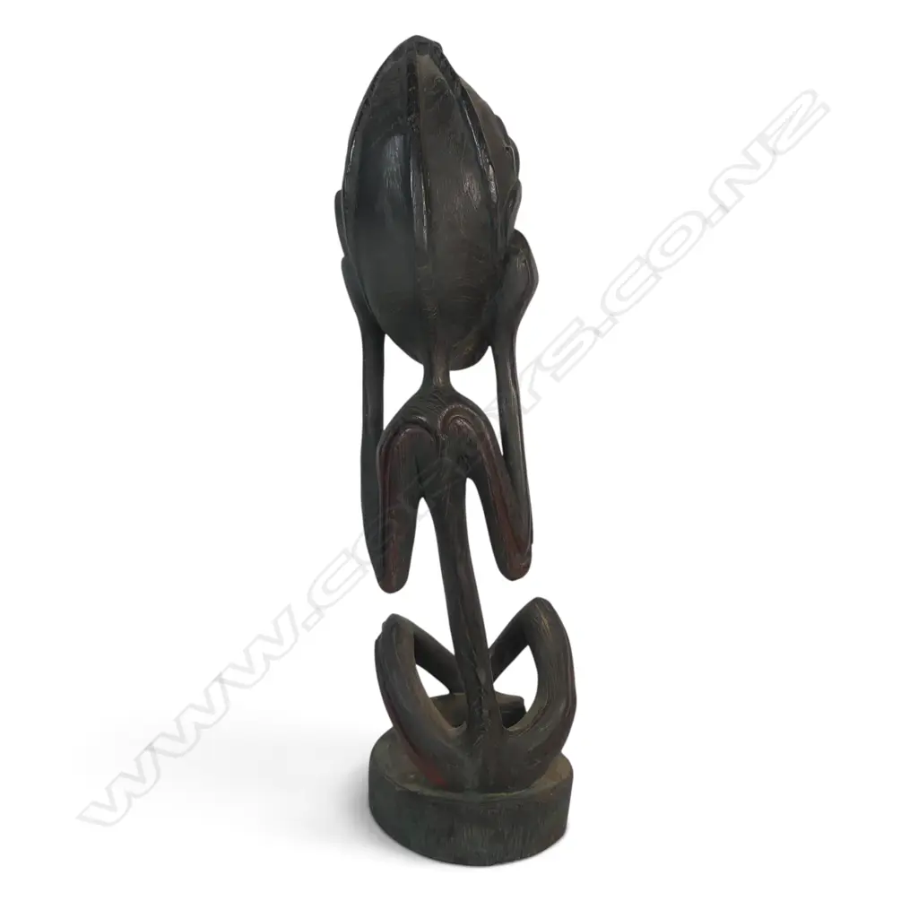 EAST AFRICAN DARK WOOD CARVING A OF SPIRIT (SHETANI IN SWAHILI) WITH AN EXAGGERATED EXPRESSION, BLUE PATINA,450 X 110MM Image 1++