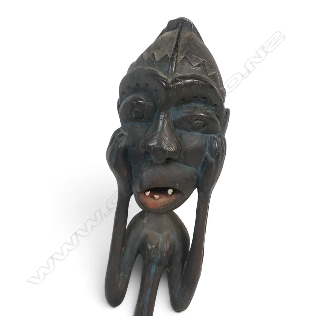 EAST AFRICAN DARK WOOD CARVING A OF SPIRIT (SHETANI IN SWAHILI) WITH AN EXAGGERATED EXPRESSION, BLUE PATINA,450 X 110MM Image 1++