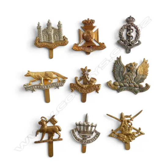 9 MILITARY CAP BADGES 