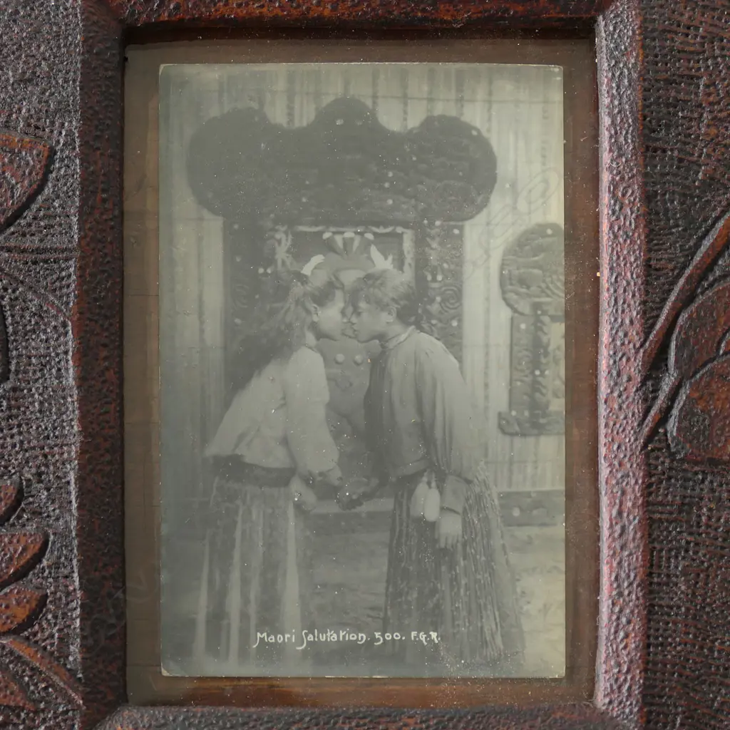 COLONIAL KAURI CHIP-CARVED FRAME WITH 3 ANTIQUE POSTCARDS OF WAHINE, 620 x 280mm Image 1++