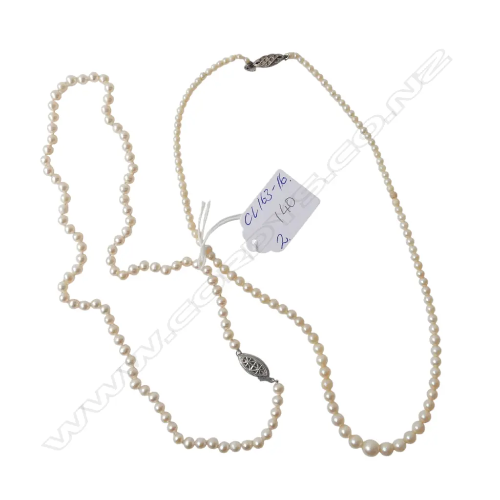 2 STRANDS OF CULTURED PEARLS: 1 salt water the other fresh Image 1++