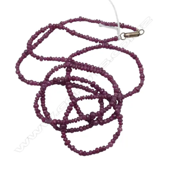 OPERA LENGTH RUBY BEAD NECKLET 180cts TW with silver magnetic clasp, 2008 valuation L.500mm