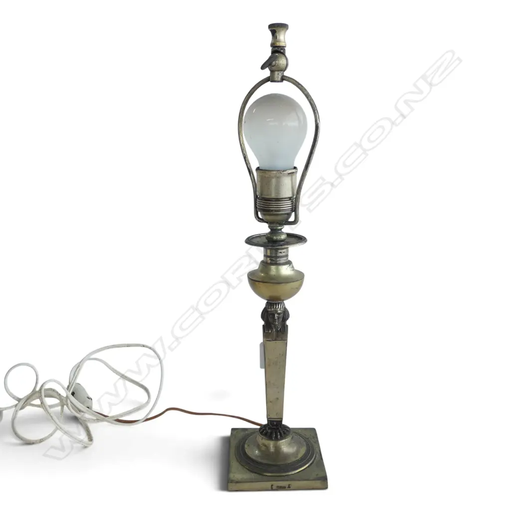 GERMAN SILVER Egyptianesque CANDLESTICK 19th/20thC converted to table lamp. Base H.250mm, double headed eagle over 13 'lothige' to either side of makers hallmark. Stamped maker's mark for Johann Heinrich Philipp Schott. '13' stamped mark denotes purity of 81.25% Image 1++