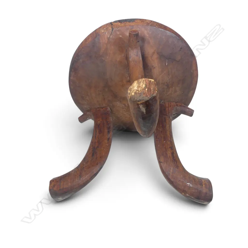 ETHIOPIAN (JIMMA PEOPLE) CARVED TRIPOD WOODEN STOOL WITH DISTINCT HORN SHAPED CURVED LEGS.H.390MM DIA 440MM Image 1++