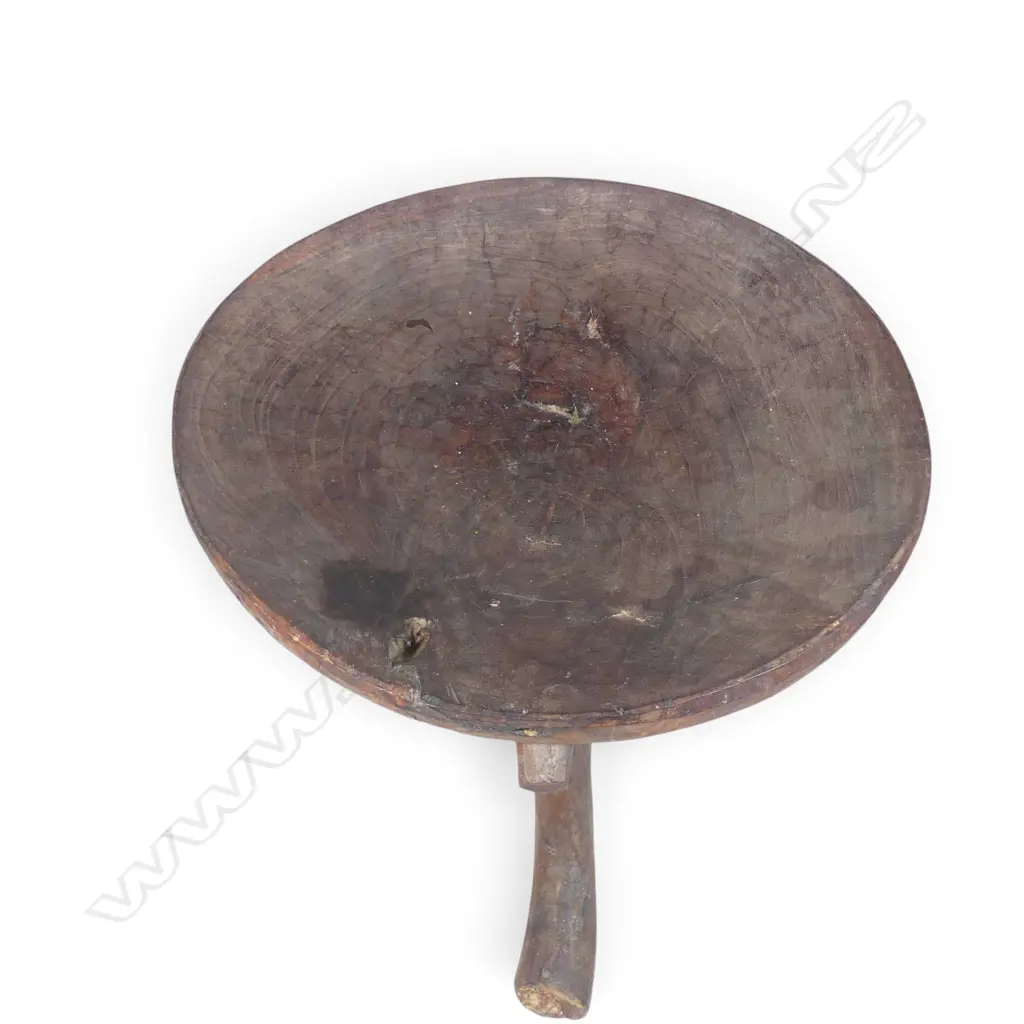 ETHIOPIAN (JIMMA PEOPLE) CARVED TRIPOD WOODEN STOOL WITH DISTINCT HORN SHAPED CURVED LEGS.H.390MM DIA 440MM Image 1++