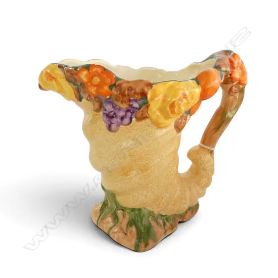 H.J. WOOD CHARLOTTE RHEAD JUG small frit to rim H.190mm