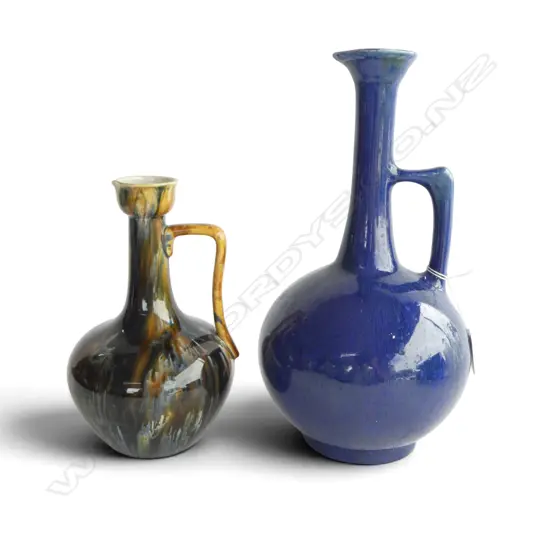 TWO ANTIQUE POTTERY EWERS: Dark streaky glaze & blue glaze. H.210MM-310MM