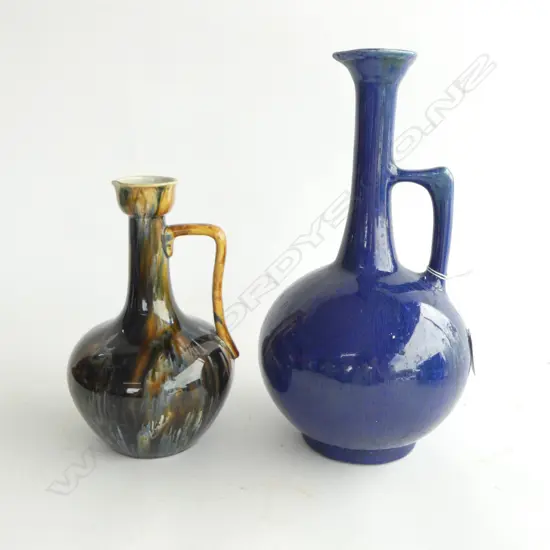 TWO ANTIQUE POTTERY EWERS: Dark streaky glaze & blue glaze. H.210MM-310MM