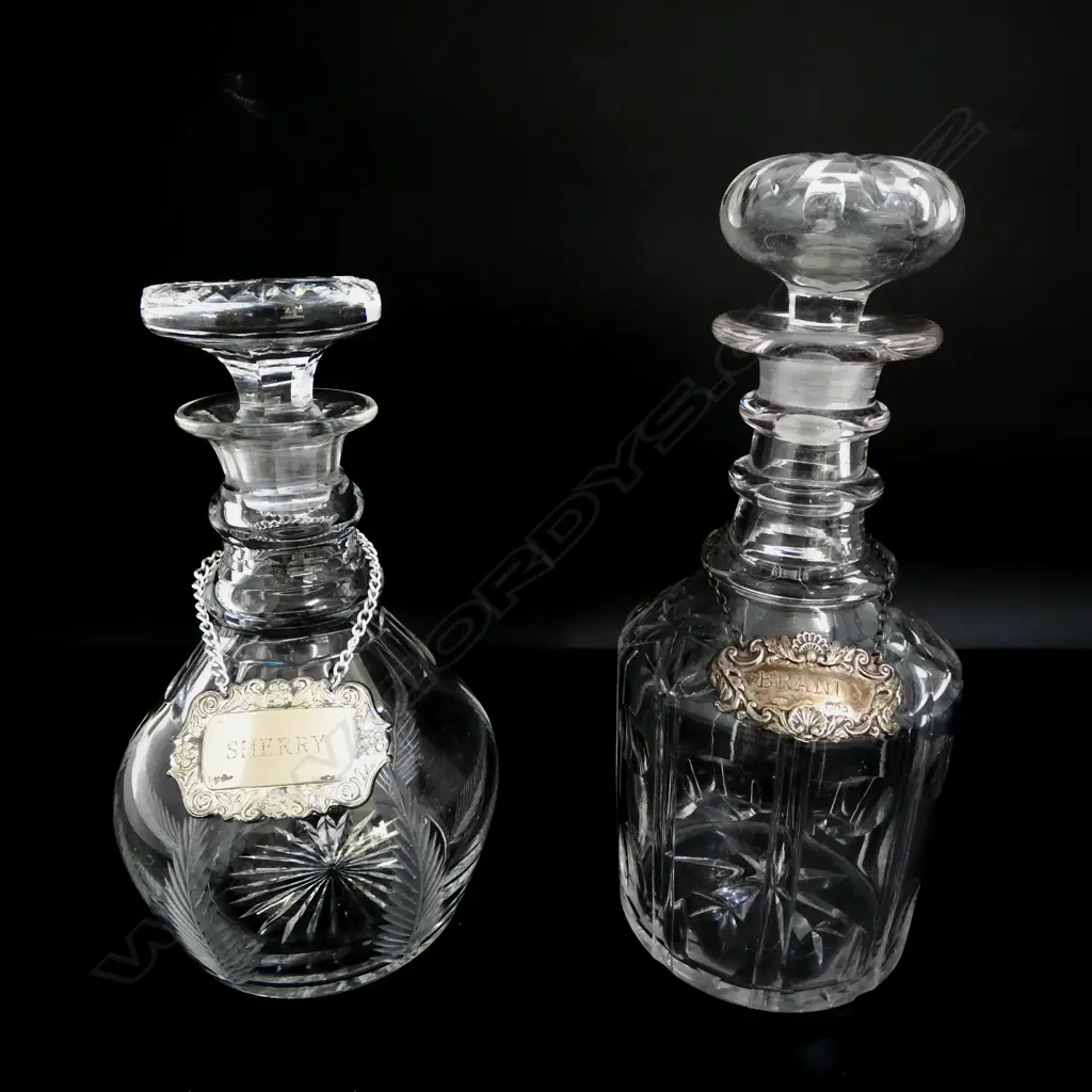 2 CRYSTAL DECANTERS w. sherry label & stg silver brandy label 10gms Image 1++