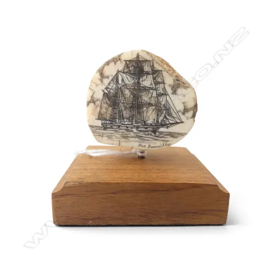 SMALL SIGNED SCRIMSHAW ON WOODEN STAND in box H.55mm