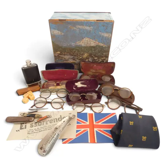COLLECTION OF VINTAGE SPECTACLES, POCKET KNIVES etc in vintage Taranaki tin W.240mm