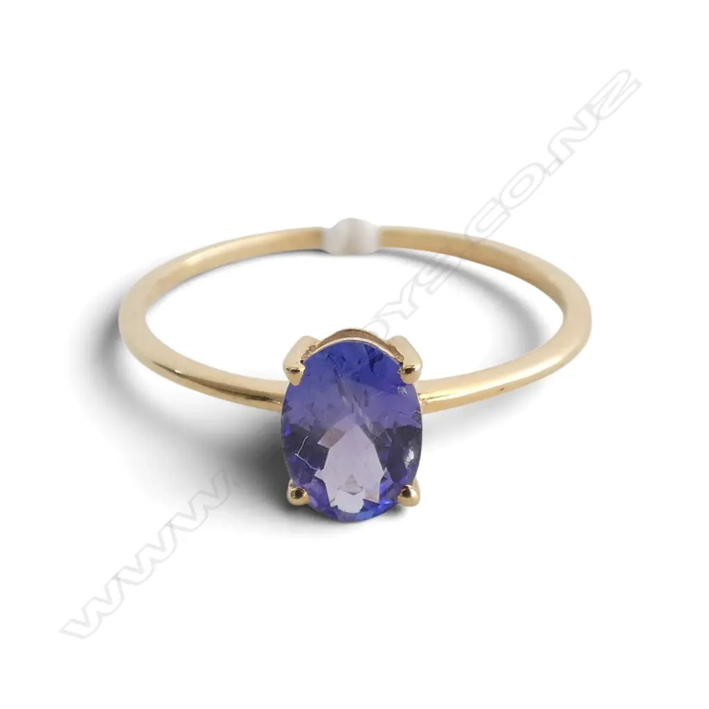 14ct TANZANITE RING, 1.05gm SIZE O Image 1++