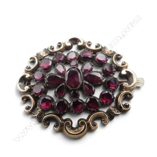 GEORGIAN SILVER GILT AND GARNET BROOCH