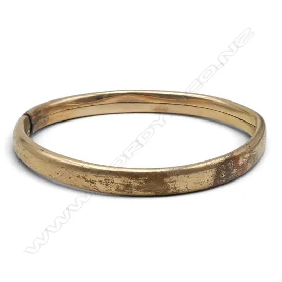 ROLLED GOLD SPRUNG BANGLE small dent