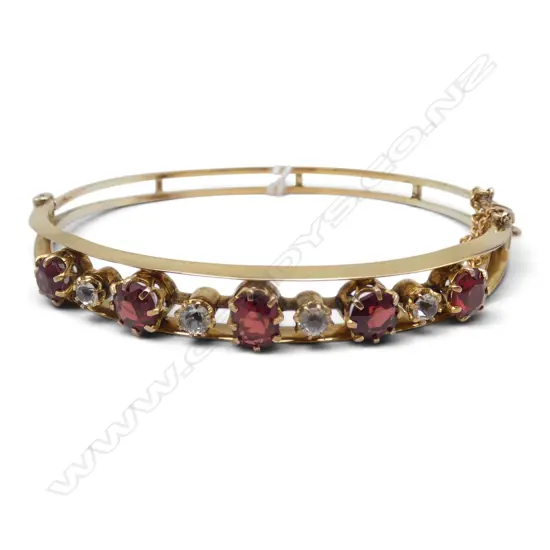 9CT GOLD GARNET AND WHITE SAPPHIRE BANGLE 11.97gms (gold weight)