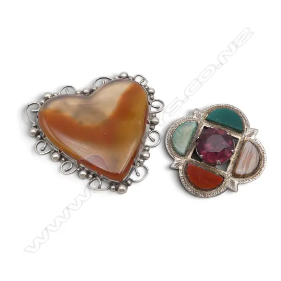 TWO SILVER AND AGATE BROOCHES
