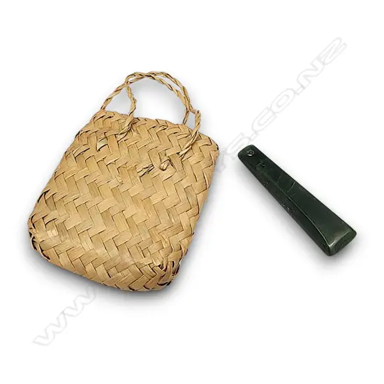 POUNAMU PENDANT IN A WOVEN KETE BAG