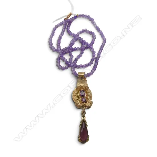AMETHYST BEAD NECKLACE WITH 15CT GOLD GEORGIAN PENDANT (substantial repair to back)