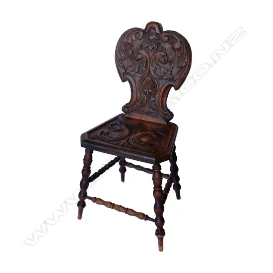 Antique European 'Alpine folk' relief carved hall chair