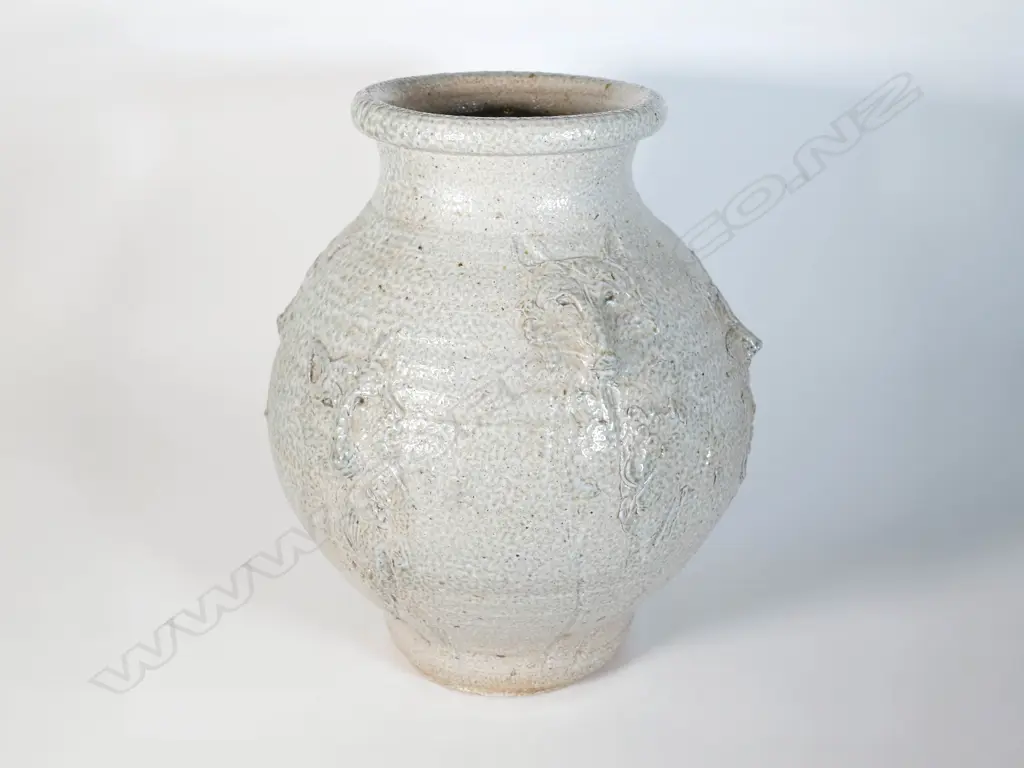 Potter Unknown - Salt glaze floor pot with wolf masks Image 1++