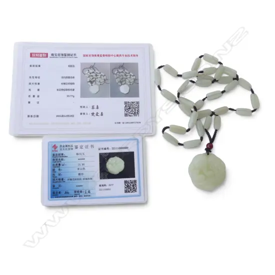 HETIAN JADE NECKLACE WITH PENDANT DEPICTING A PIXIU - ACCOMPANIED BY TWO TESTING CERTIFICATES