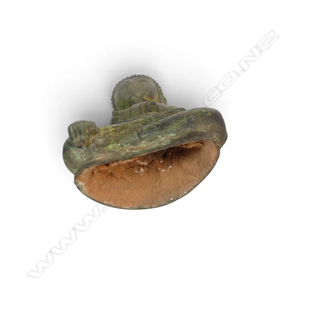 SOUTHEAST ASIAN SEATED BRONZE BUDDHA WITH DARK GREEN PATINA IN MEDITATIVE POSE (MUDRA), CLAY FILLING THE BASE. H.280MM Image 1++