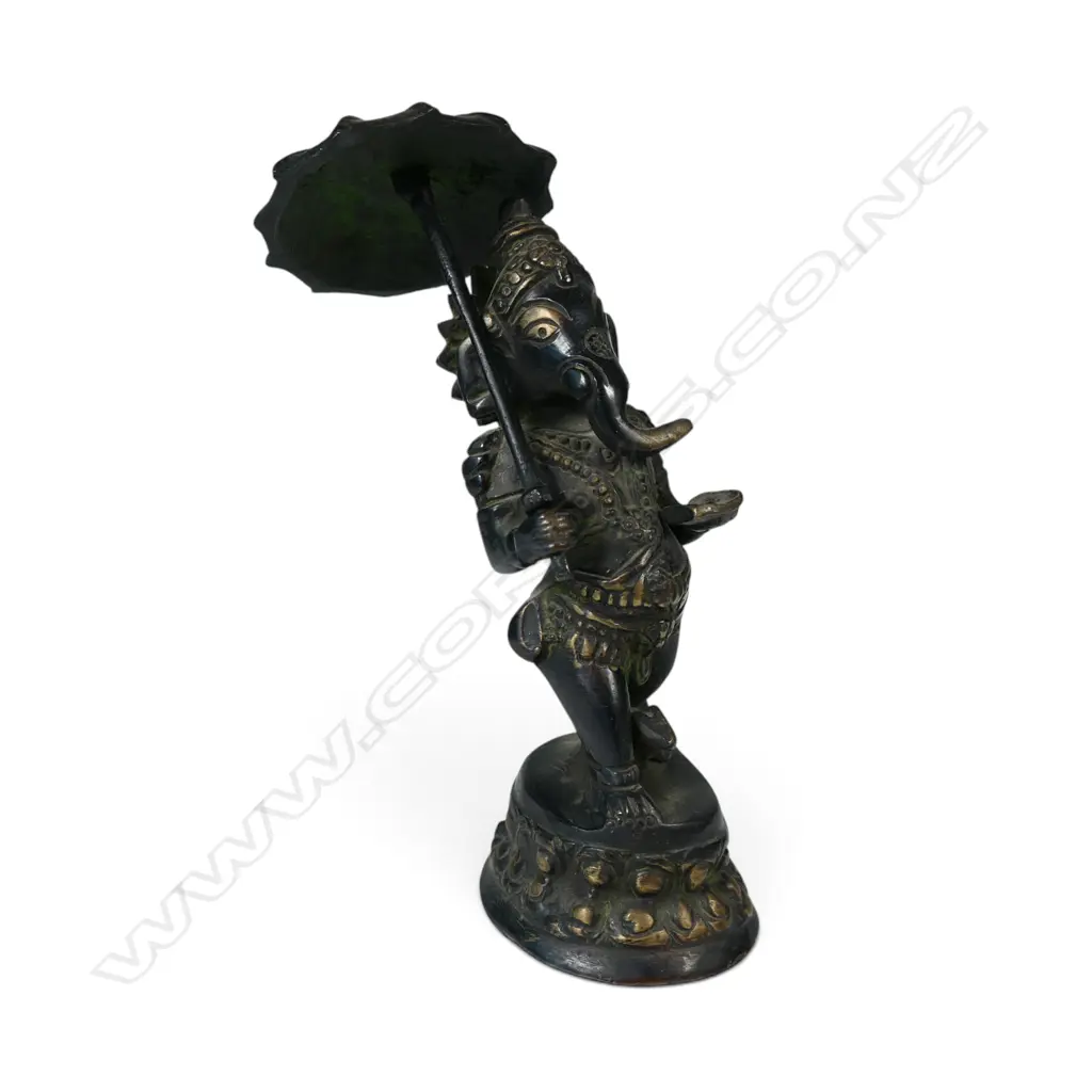DARK METAL BRONZED FIGURINE OF GANESHA HOLDING A CANOPY SYMBOLIZING DIVINE PROTECTION. H.150MM Image 1++