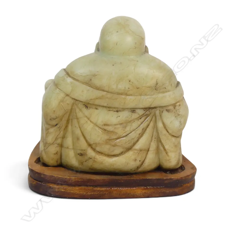 CARVED LIGHT GREEN SOAPSTONE HOTEI LAUGHING BUDDHA WITH BROWN PATINA SEATED ON A WOODEN BASE. H.160MM Image 1++