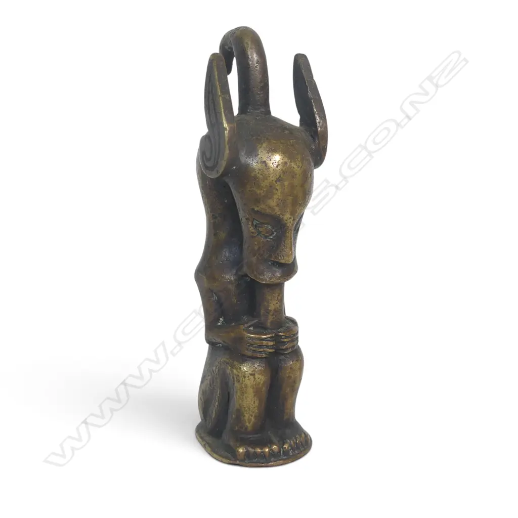 HEAVY BRASS TRIBAL FIGURINE WITH WINGED HEAD, 110 X 30MM Image 1++