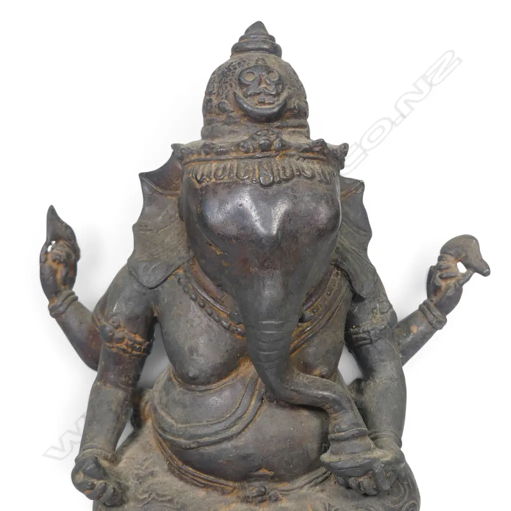 INDIAN  BRONZED SCULPTURE OF SEATING GANESHA ON A LOTUS FLOWER,SUBTILE AGED PATINE AND OXIDATION TO THE INSIDE. H.310MM Image 1++