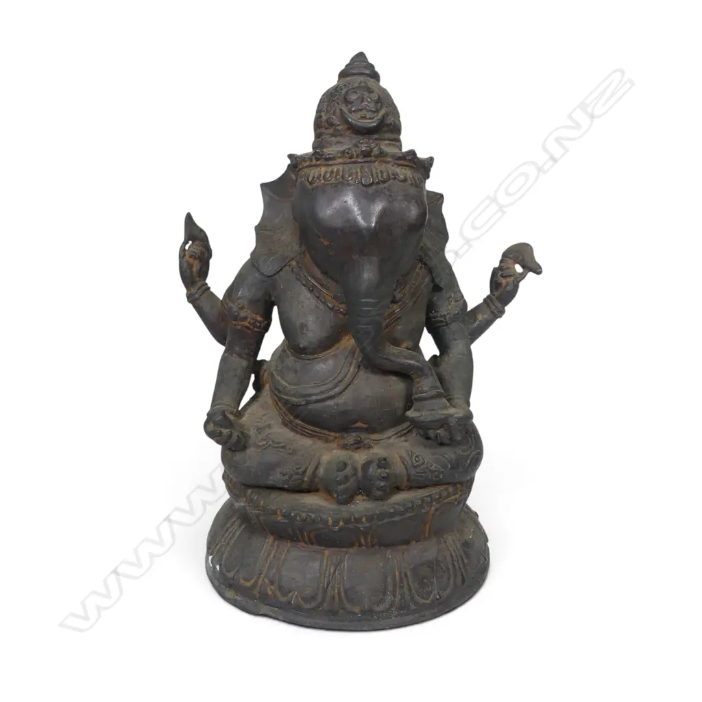 INDIAN  BRONZED SCULPTURE OF SEATING GANESHA ON A LOTUS FLOWER,SUBTILE AGED PATINE AND OXIDATION TO THE INSIDE. H.310MM Image 1++