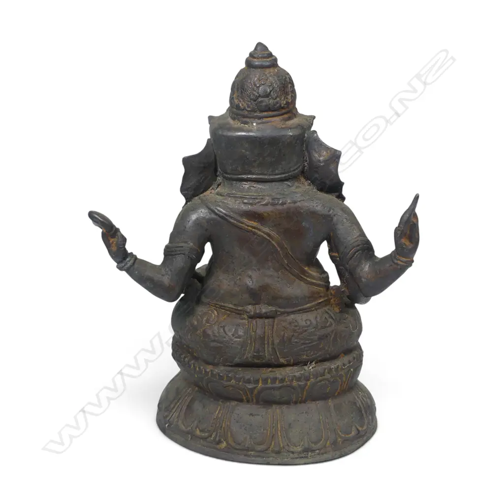 INDIAN  BRONZED SCULPTURE OF SEATING GANESHA ON A LOTUS FLOWER,SUBTILE AGED PATINE AND OXIDATION TO THE INSIDE. H.310MM Image 1++
